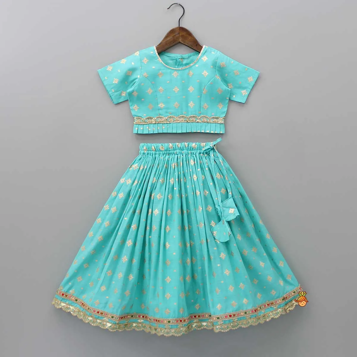 Pre Order: Chanderi Embroidered Teal Green Top And Lehenga With Contrasting Dupatta