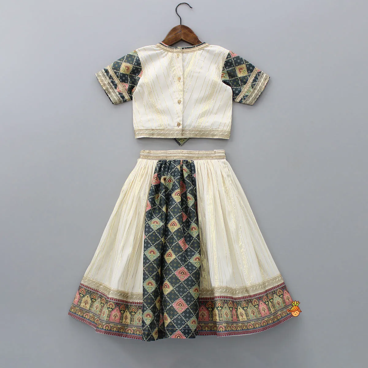 Pre Order: V Neck Lurex Striped Lace Work Ivory Top And Tassels Enhanced Lehenga With Matching Dupatta
